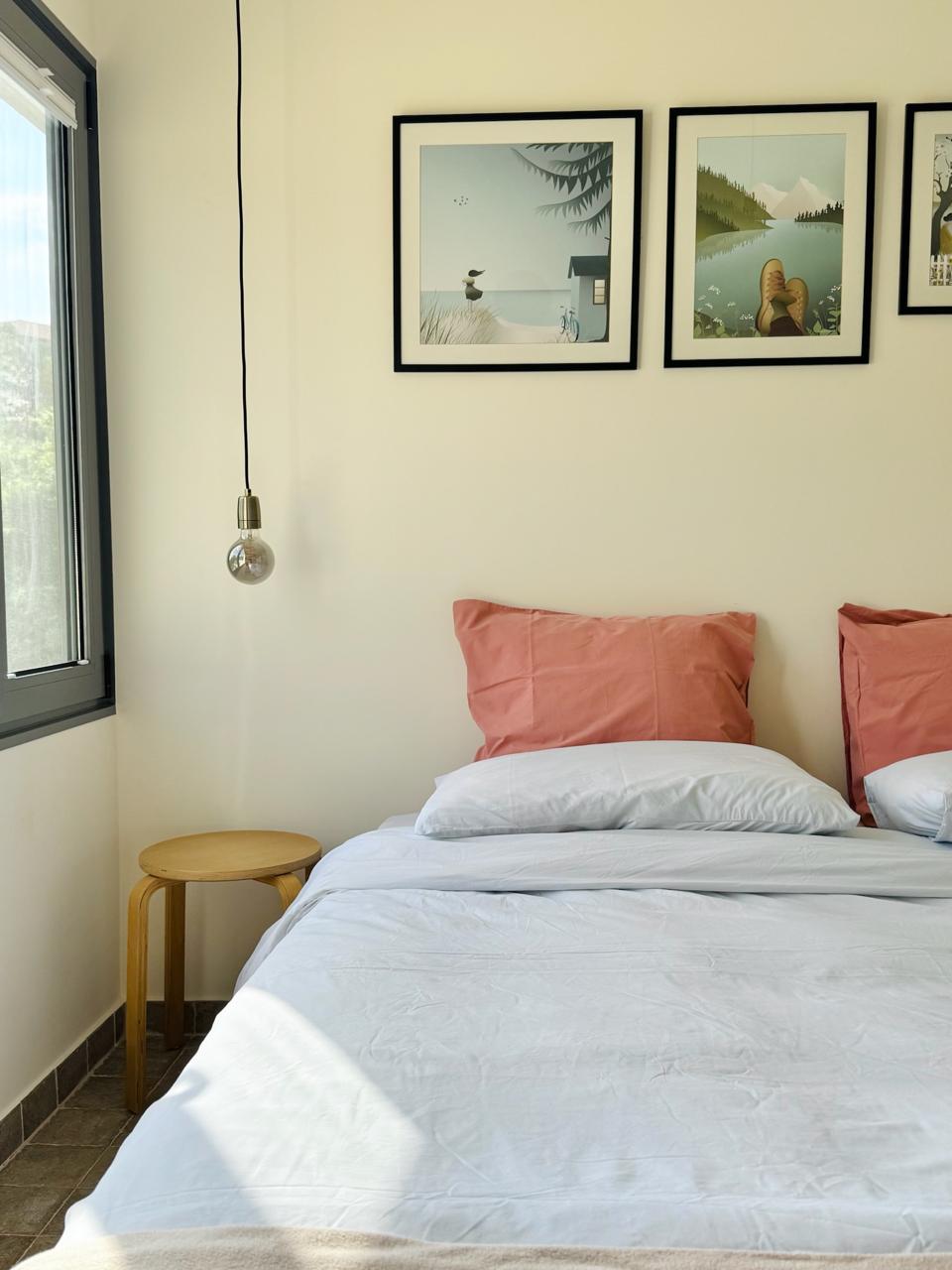 King Room at SOWK Guesthouse — A simple, calming space with a comfortable king bed, natural textures, and thoughtful details—quietly designed for rest and ease at SOWK Guesthouse.